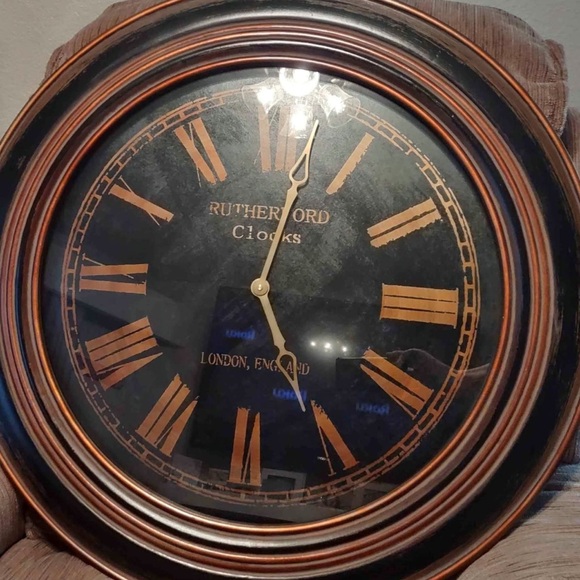 Black and Brown Wall Clock